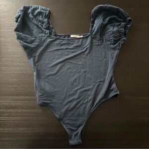 Francesca’s Mi Ami Sleeveless Puff Sleeve Blue Bodysuit NWOT